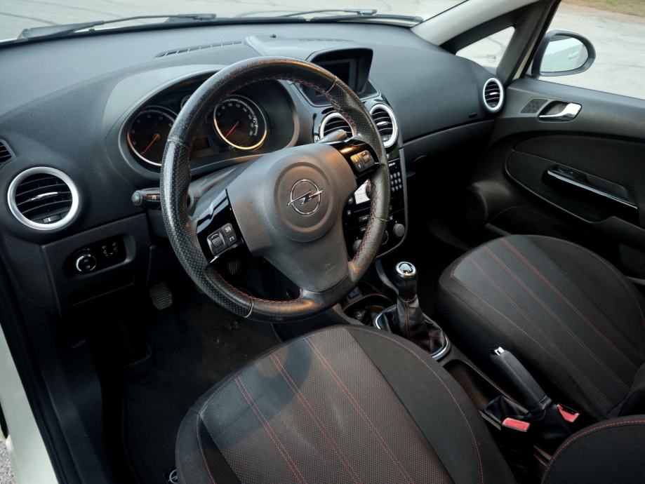 Opel Corsa 1,4 16V, alu felge, zatamnjena stakla, prvi vlasnik, fotografija 11