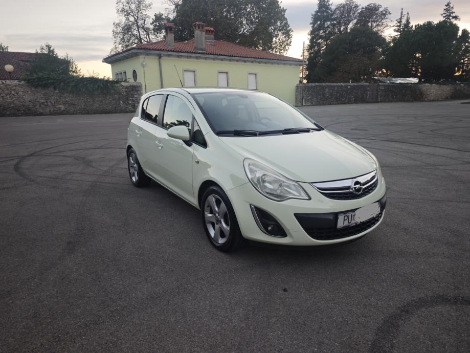 Opel Corsa 1,4 16V, alu felge, zatamnjena stakla, prvi vlasnik, fotografija 2