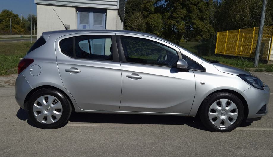 Opel Corsa 1,4****PARK. SENZORI***REG 8./2027.****ODLIČAN****, fotografija 9