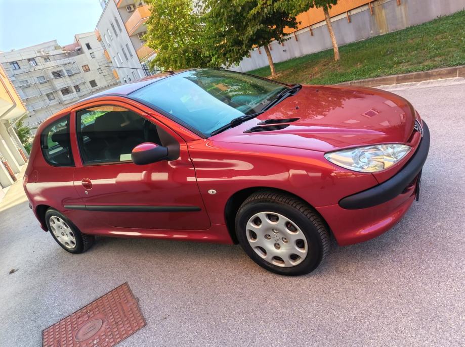 Peugeot 206 1,4 TRENDY 2009.god. PRVI VLASNIK,KLIMA ,REG. DO 9/2027, fotografija 13