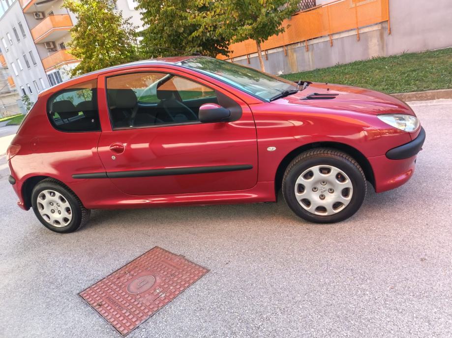 Peugeot 206 1,4 TRENDY 2009.god. PRVI VLASNIK,KLIMA ,REG. DO 9/2027, fotografija 15