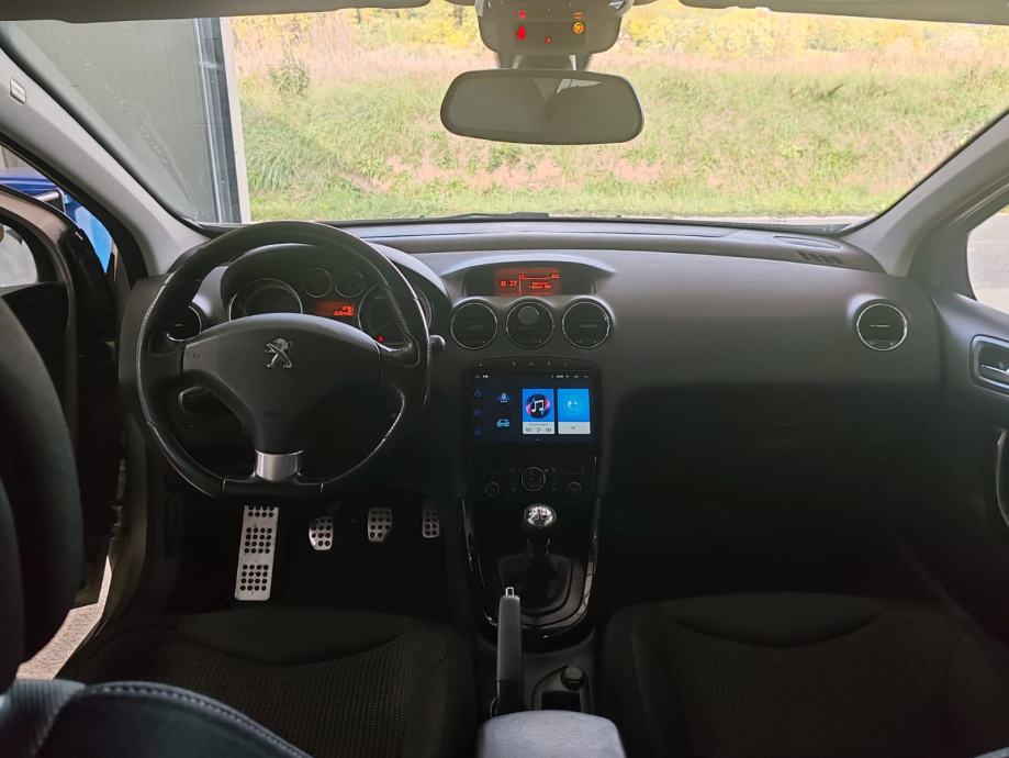 Peugeot 308 1,6 e-HDi Style, fotografija 11