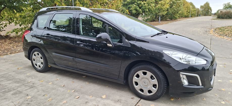 Peugeot 308 SW 1,6 HDi panoramski krov,klima,tempomat..., fotografija 6