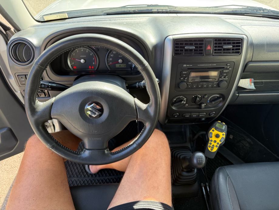 Suzuki Jimny 1,3 Club sa Ralicom za snijeg 35.000 km, fotografija 13