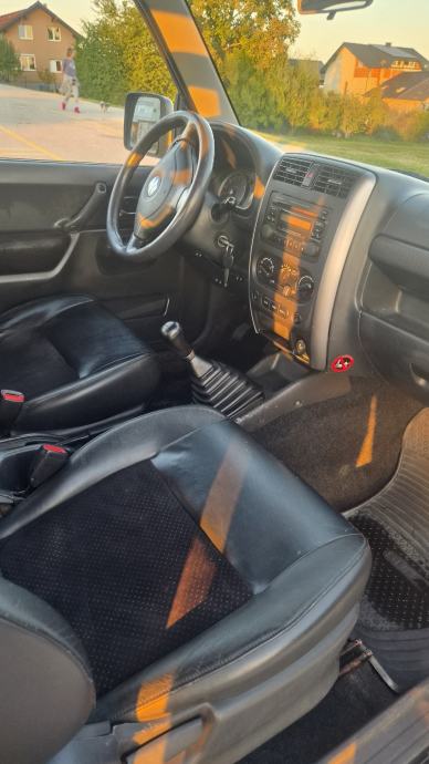 Suzuki Jimny 1,3 FULL OPREMA 4x4/Klima/Grianje Sjedala, fotografija 11