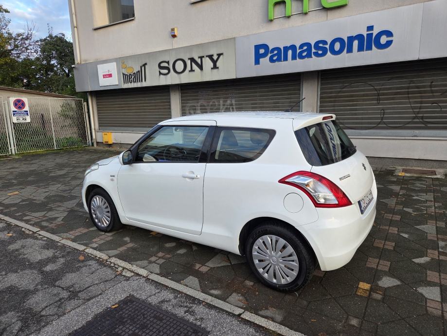 SUZUKI SWIFT 1,3 d GLX 75 KS- KLIMA-SERVISNA-REG 12 MJ, fotografija 7