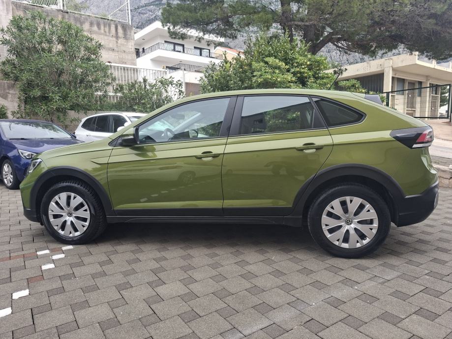 VW Taigo 1,0 TSI ✅️PARK SENZORI✅️GRIJANJE SJEDISTA✅️LED U PDV-U, fotografija 11