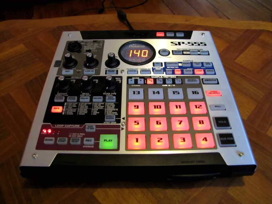 Roland SP555 sampler, audio interface, sequencer, pad controller