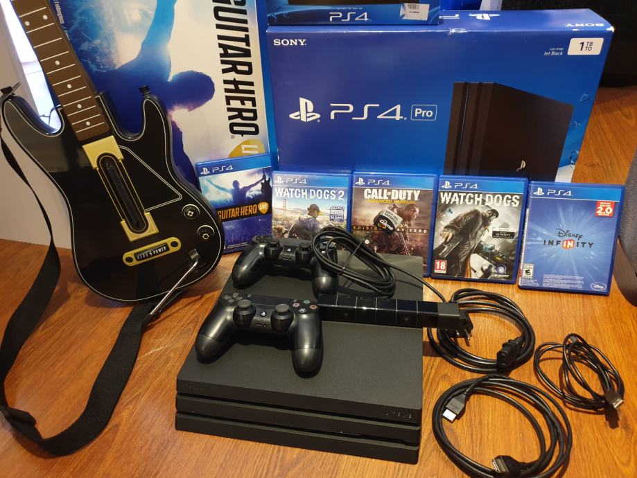 PS4 Pro, 2 Joysticka, 5 igra, PS Kamera, Guitar Hero Bundle