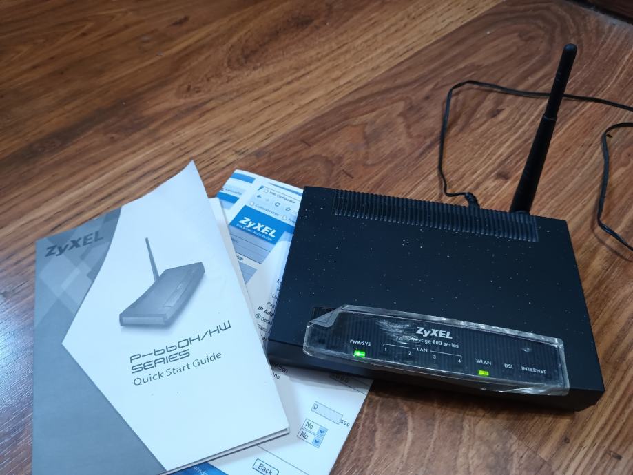 ROUTER ZYXEL ZA ŽIČNI I BEŽIČNI SA ORIGINAL ADAPTEROM VIŠAK