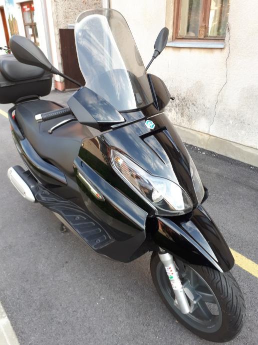 COPRIGAMBE PRO LEG L PIAGGIO BEVERLY TOU/CRU 125/200/250/300/350/400/500 - 4