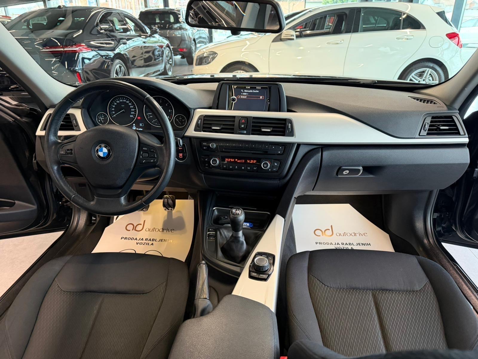 BMW serija 3 318d REGISTRIRAN • PARK. SENZORI • ALU16" • AUTOKREDIT, fotografija 15