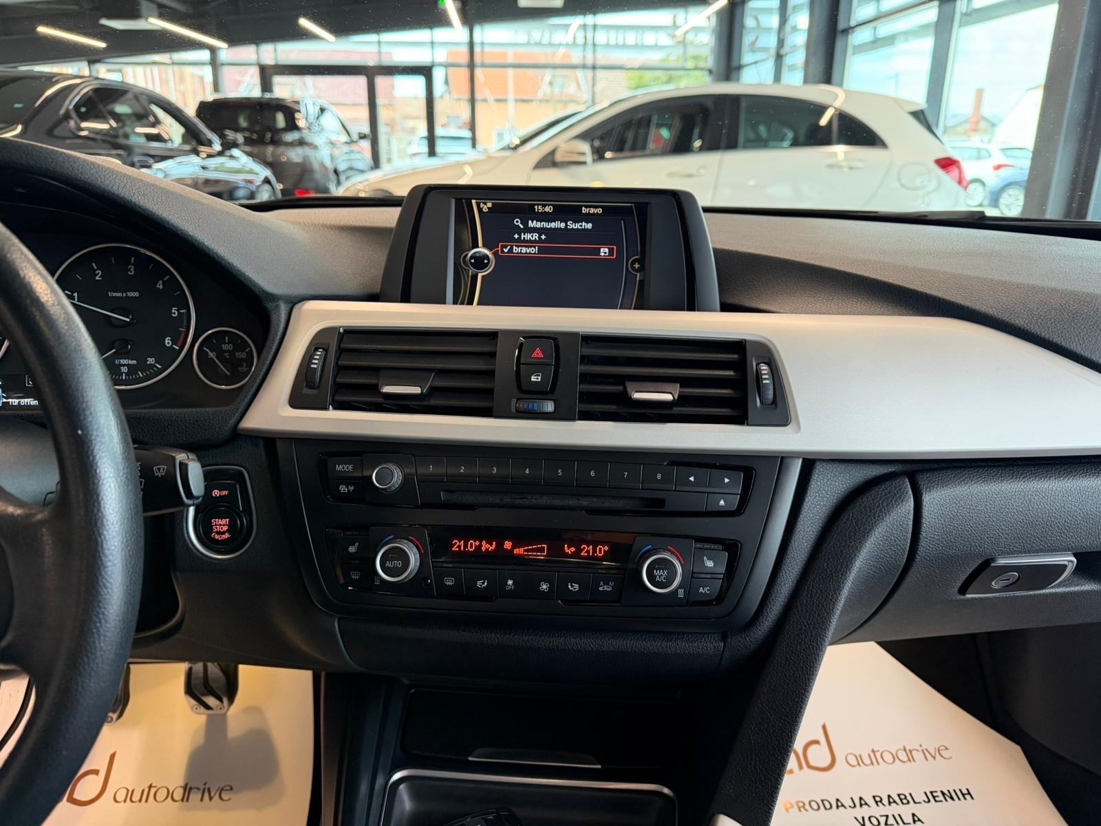BMW serija 3 318d REGISTRIRAN • PARK. SENZORI • ALU16" • AUTOKREDIT, fotografija 18