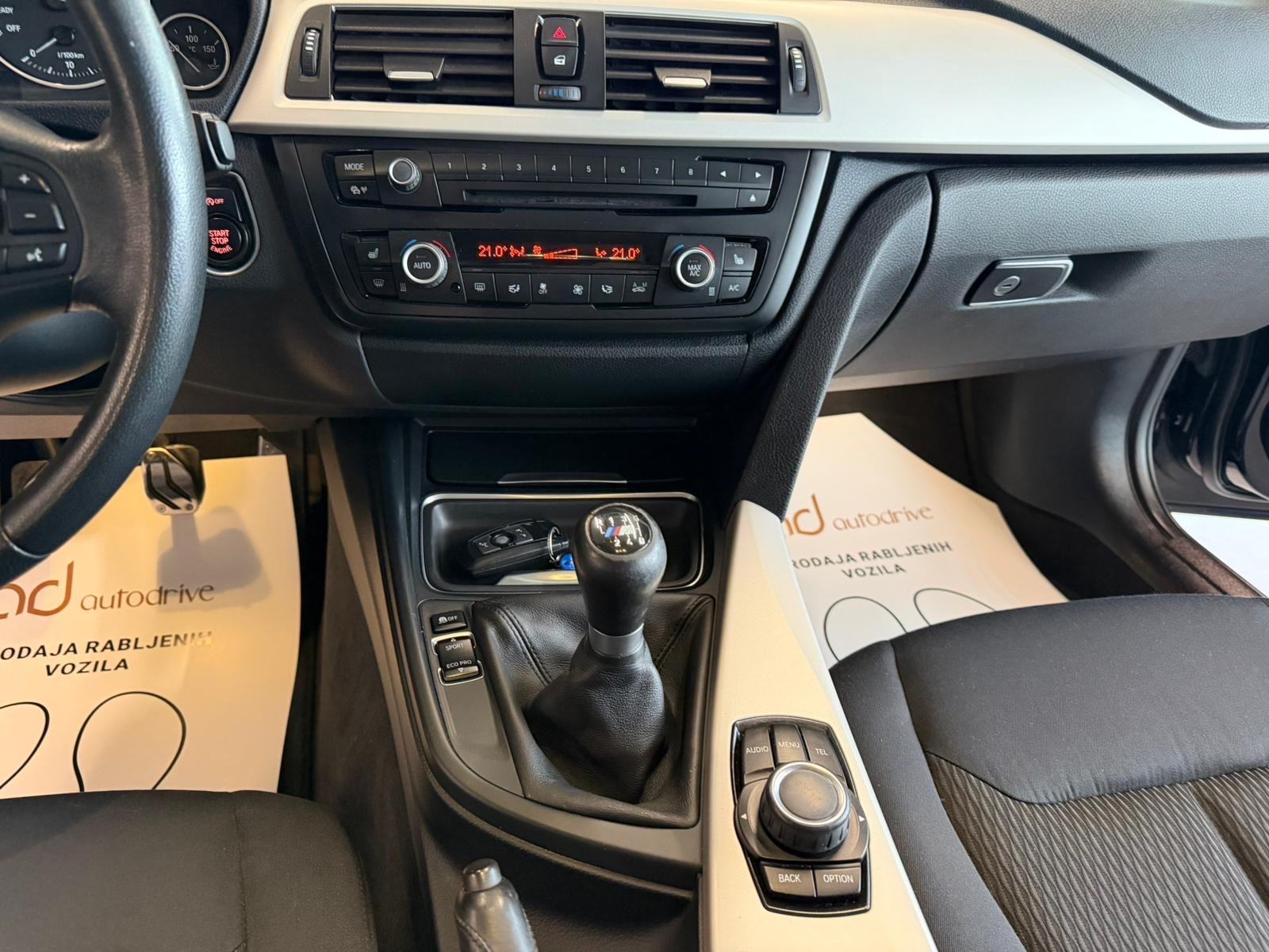 BMW serija 3 318d REGISTRIRAN • PARK. SENZORI • ALU16" • AUTOKREDIT, fotografija 19