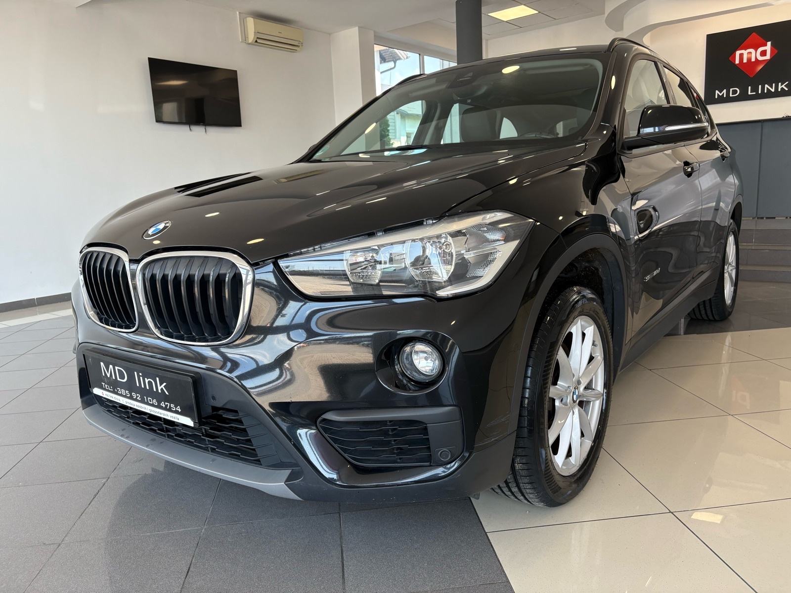 BMW X1 sDrive 18d Advantage, fotografija 15