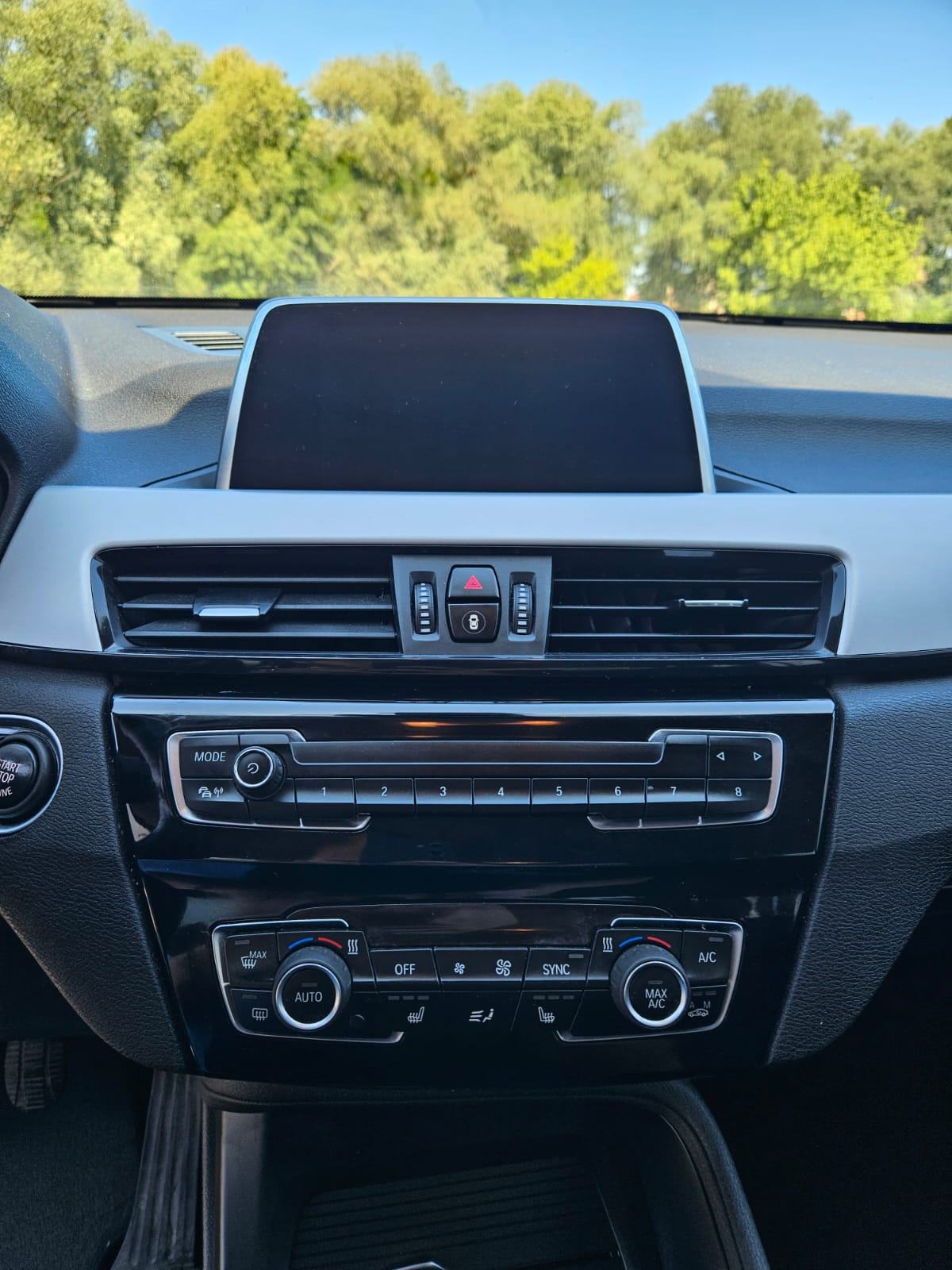 BMW X1 sDrive18d, fotografija 11