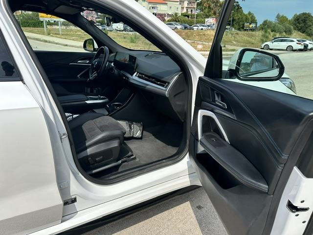 BMW X1 sDrive18d, fotografija 16