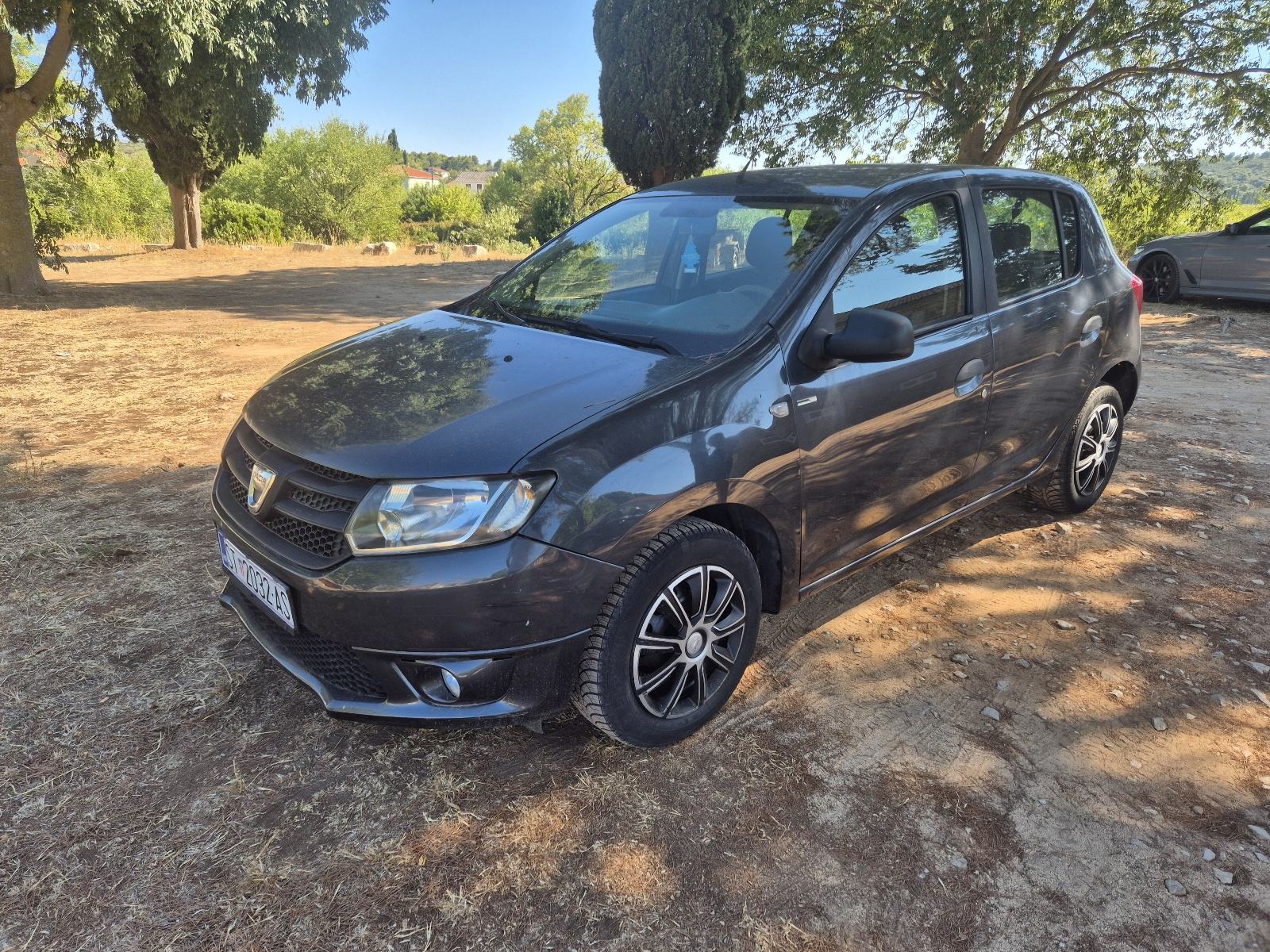 Dacia Sandero 1,2 16V - EURO 6 - PLIN - KLIMA - MALO KM - REG. DO 2/27, pogled izvana - slika 5