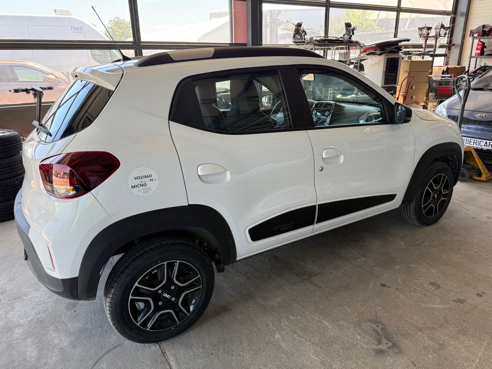 Dacia Spring 2024g HR auto, reg 6.27. na ime kupca prodajem...., fotografija 5