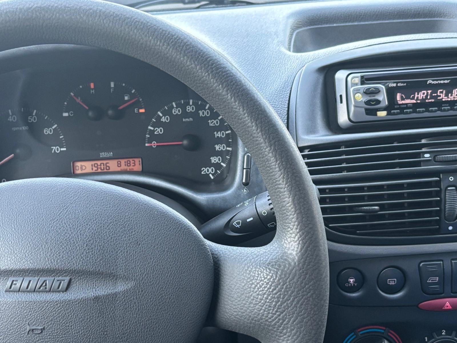 Fiat Punto 1.2 benzin, 1. Vlasnik, samo 81ooo kilometara, servo, klima, fotografija 11
