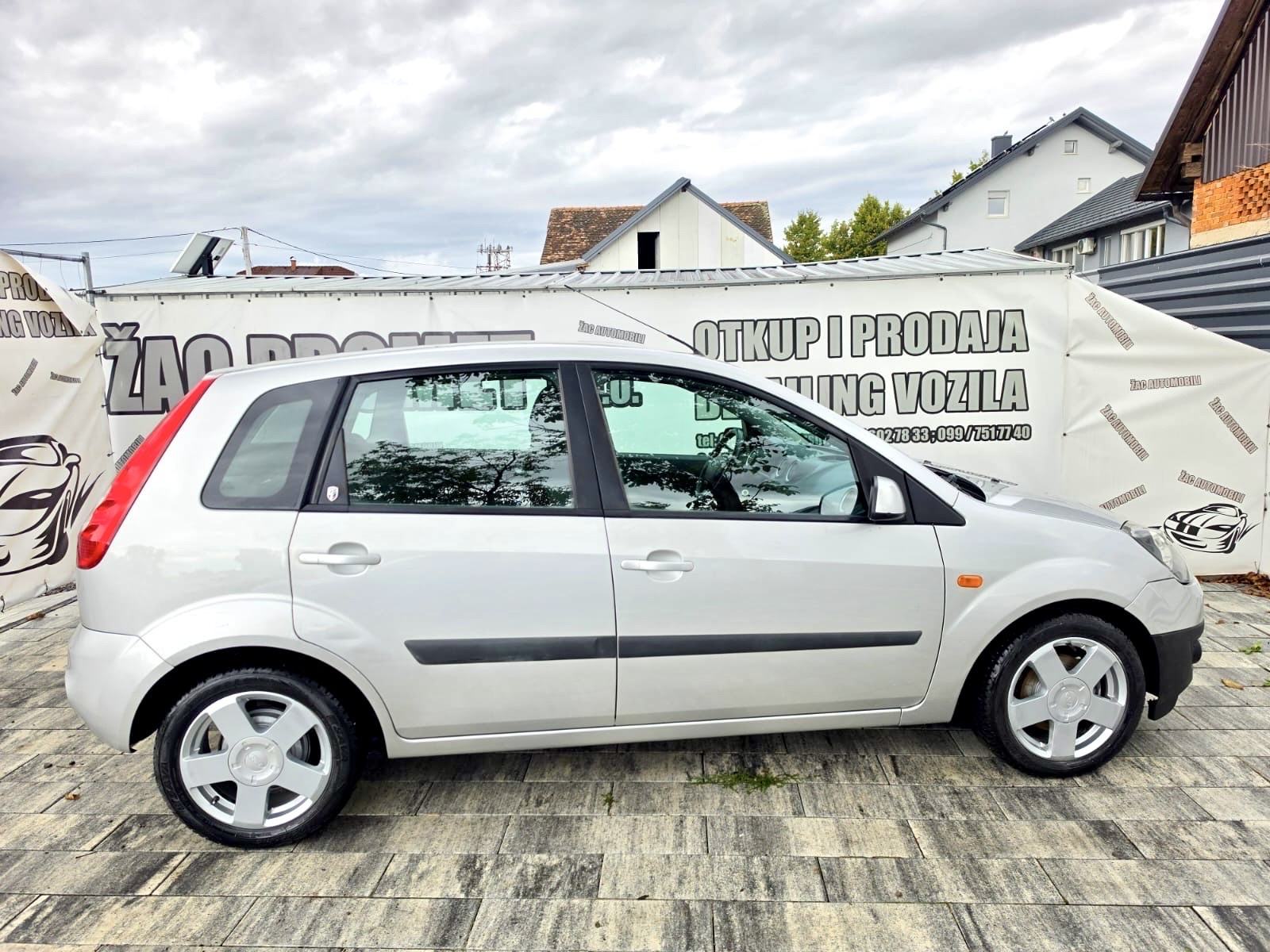 Ford Fiesta 1,4 GHIA # 119 TKM # KAO NOVA KRED-KART HR-AUTO, fotografija 9