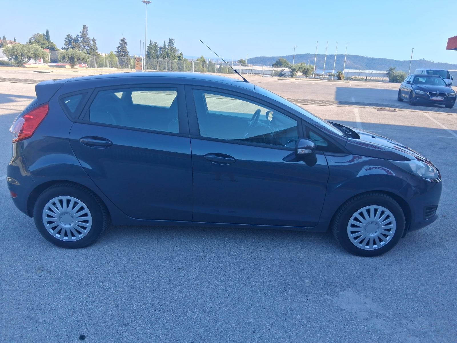 Ford Fiesta 1,6-tdci - ODLICAN - 198.000km - REG.CILU GODINU, pogled izvana - slika 4