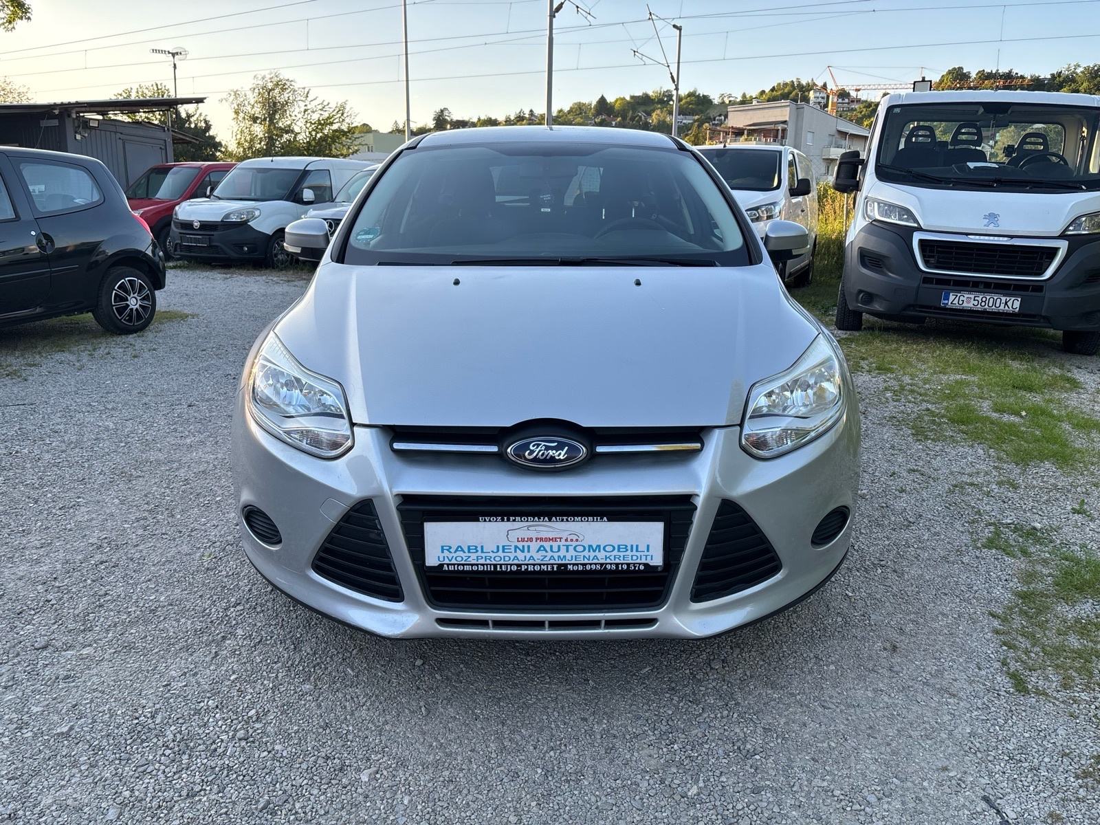 Ford Focus Karavan 1,6 TDCI-KLIMA-NAVI-PDC-MFV-NEMA 5%-KARTICE-36 RATA, fotografija 2
