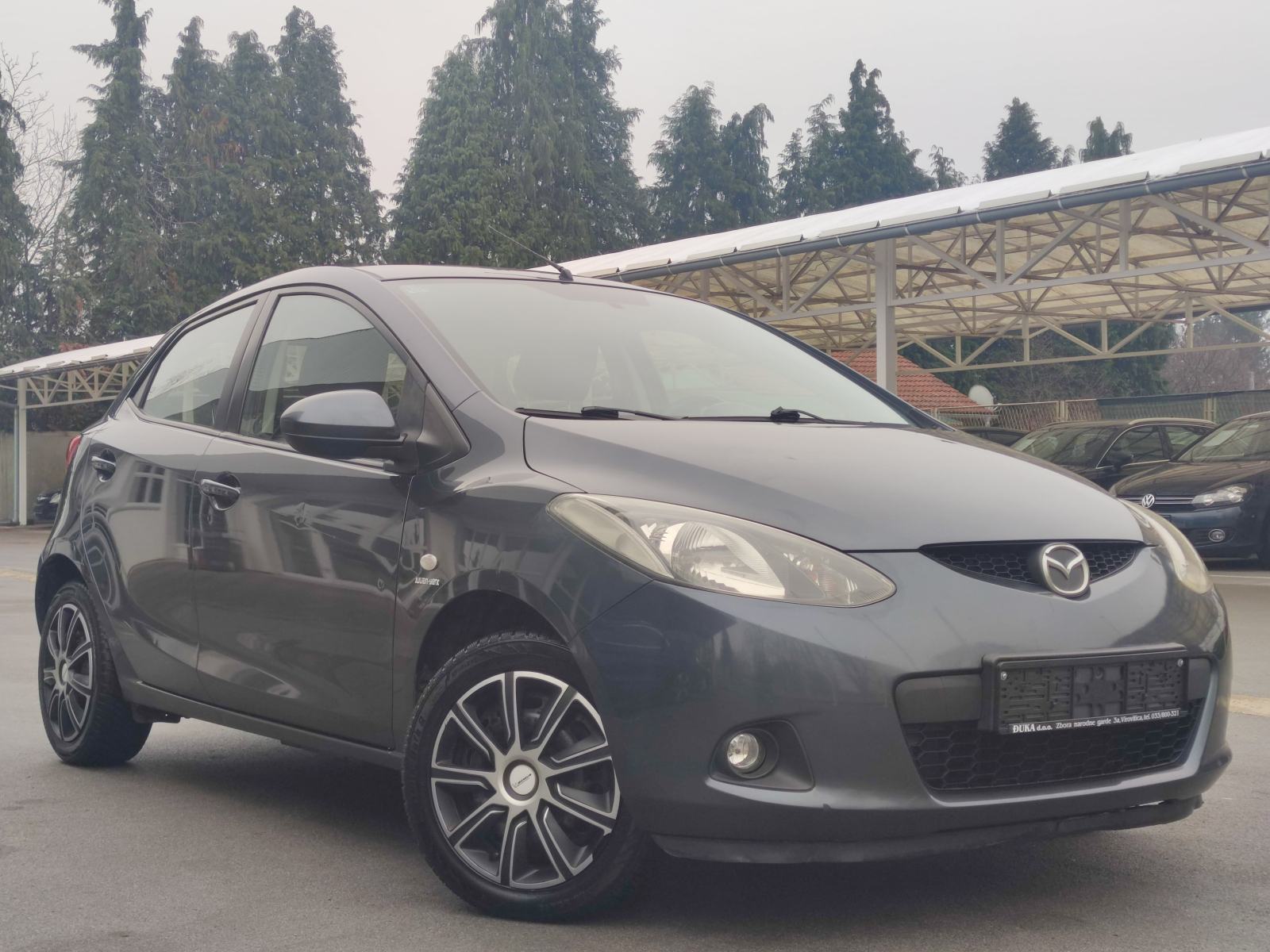 Mazda 2 1.4 CD KLIMA PARKING SENZORI PUTNI KOMPJUTER, fotografija 1