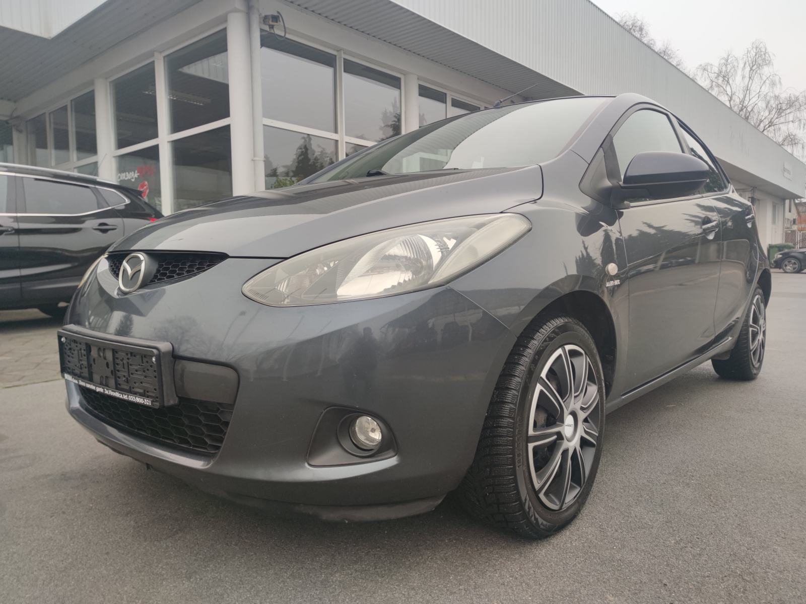 Mazda 2 1.4 CD KLIMA PARKING SENZORI PUTNI KOMPJUTER, fotografija 6