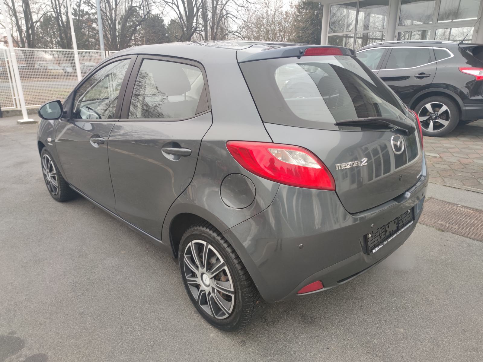 Mazda 2 1.4 CD KLIMA PARKING SENZORI PUTNI KOMPJUTER, fotografija 8