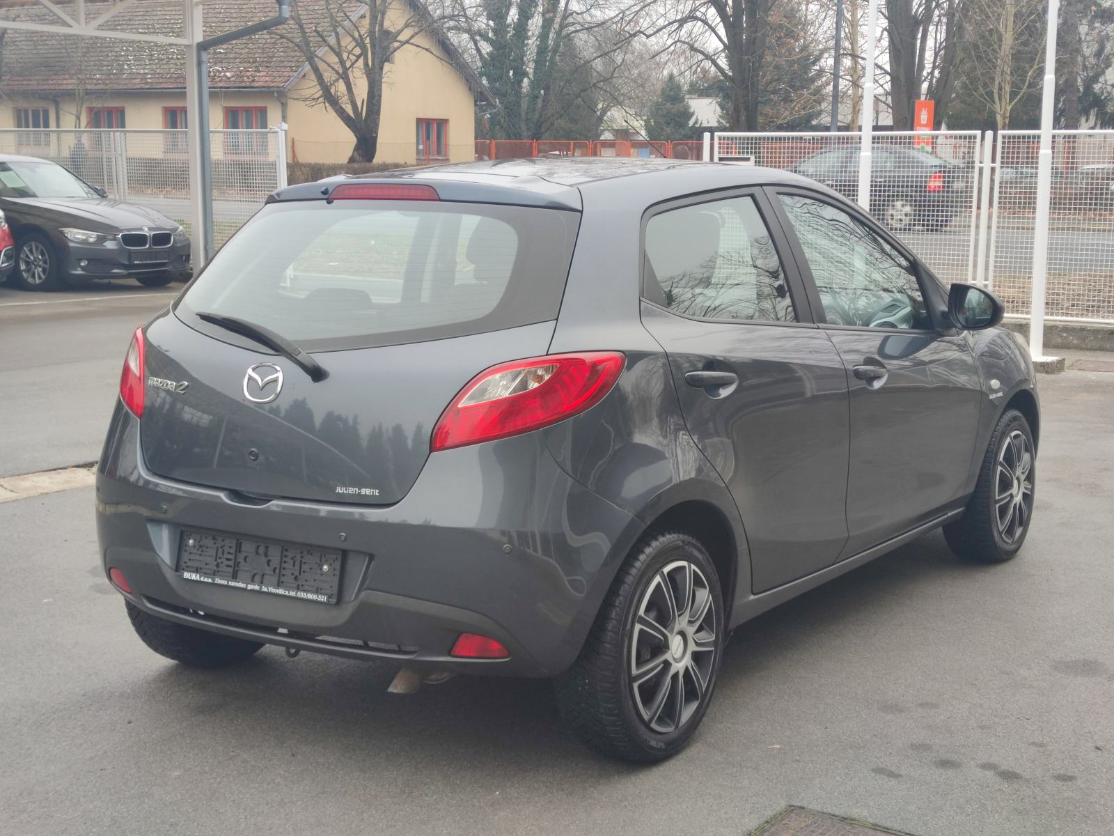 Mazda 2 1.4 CD KLIMA PARKING SENZORI PUTNI KOMPJUTER, fotografija 12