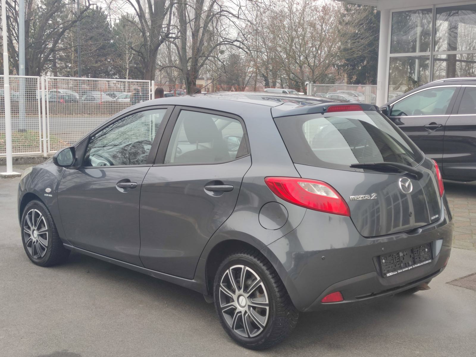 Mazda 2 1.4 CD KLIMA PARKING SENZORI PUTNI KOMPJUTER, fotografija 9