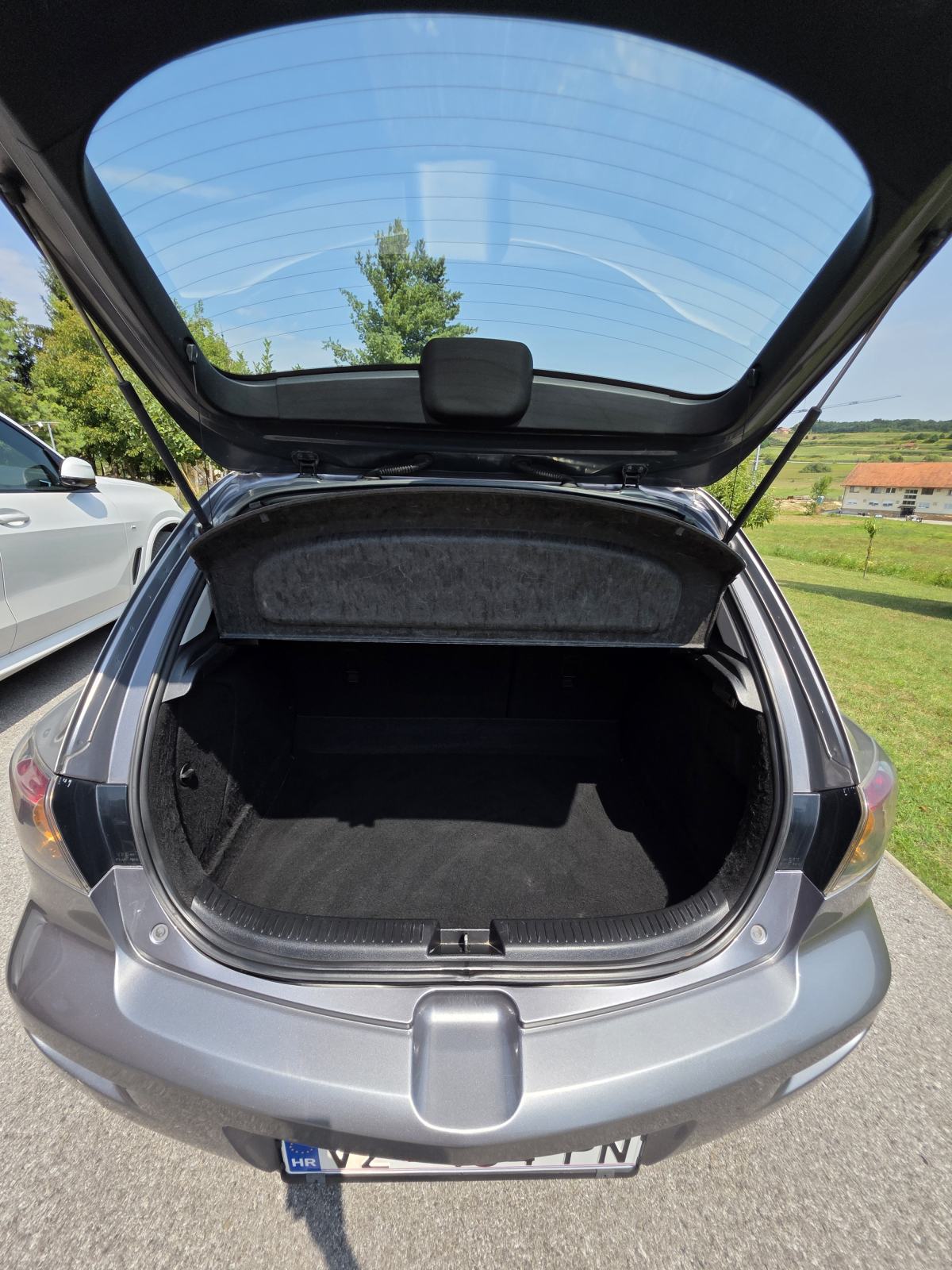 Mazda 3 Sport 1,4 i CE, fotografija 9