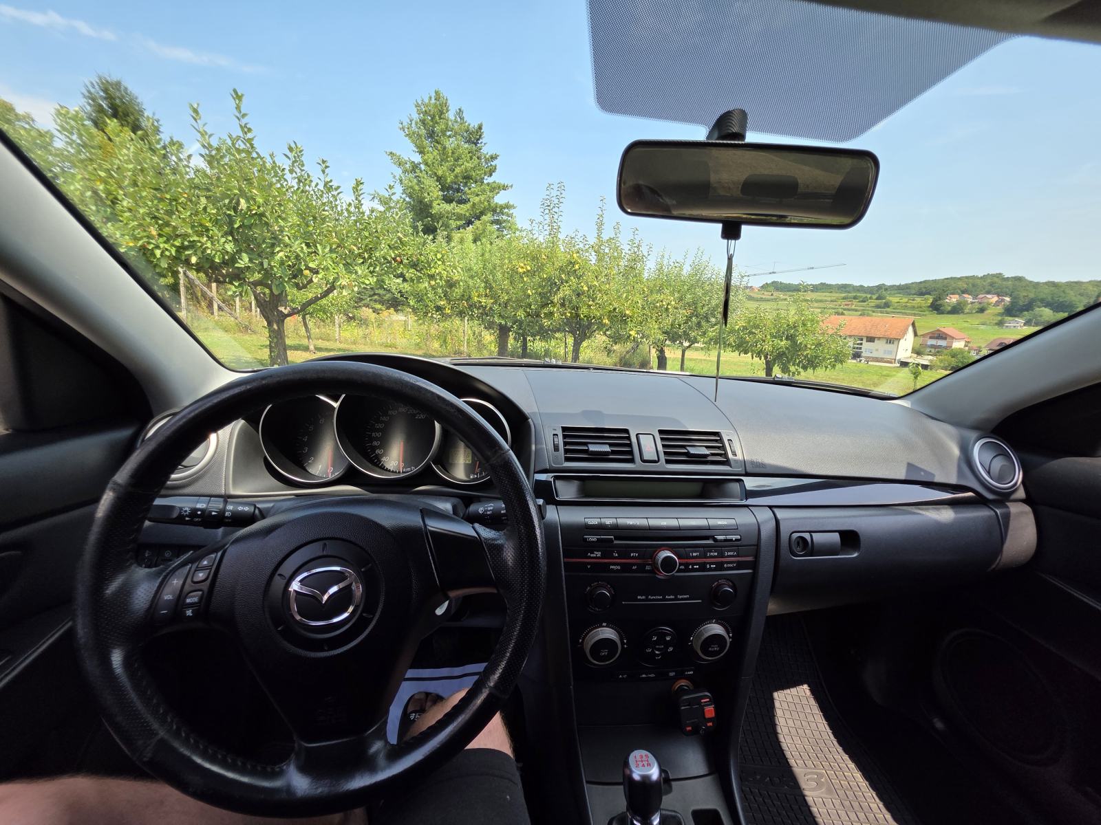 Mazda 3 Sport 1,4 i CE, fotografija 7