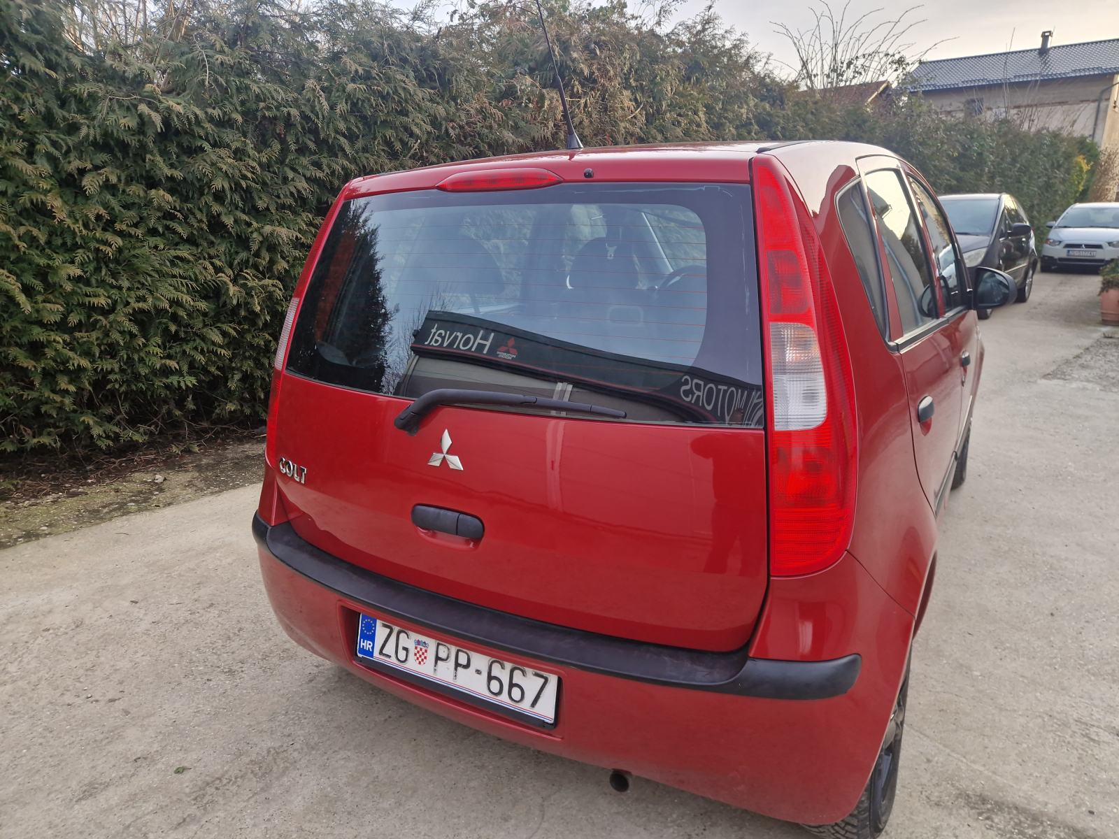 Mitsubishi Colt 1,1 KLIMA KARTICE DO 36 MJ JAMSTVO DOGOVOR, fotografija 13