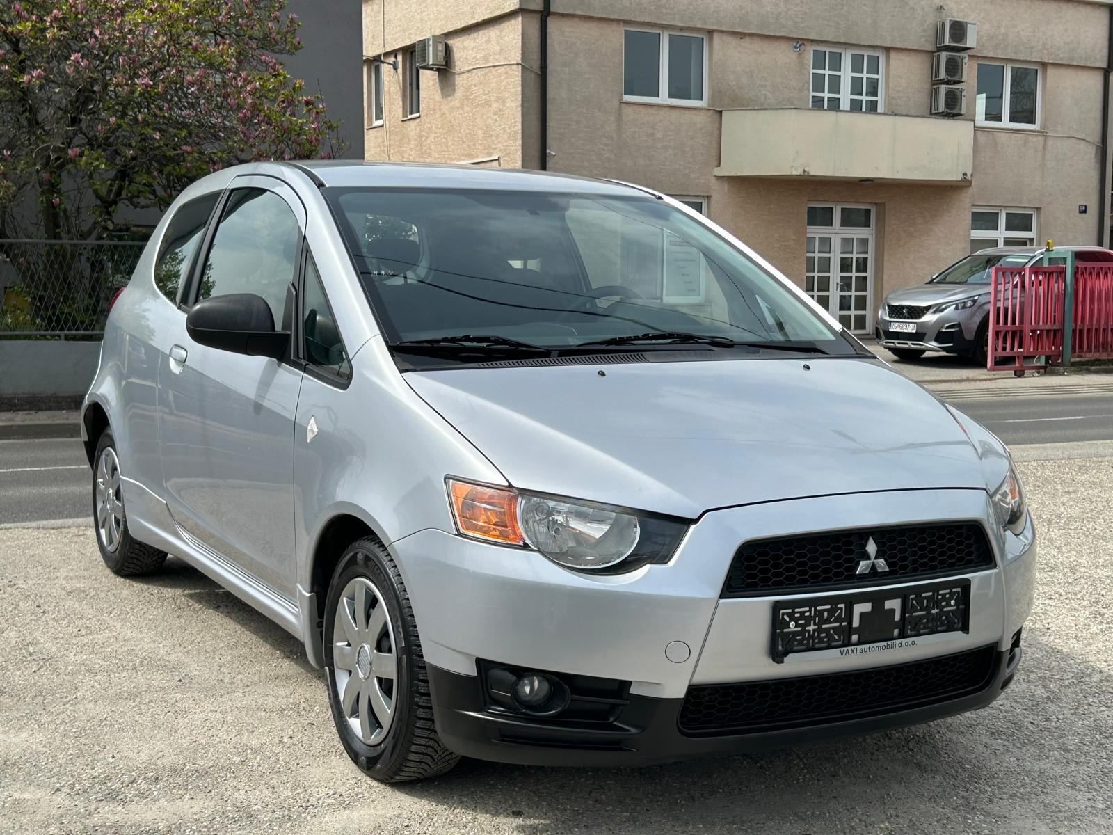 Mitsubishi Colt 1.1 2013g. 87.000km. klima....grijanje sjedala..., fotografija 3