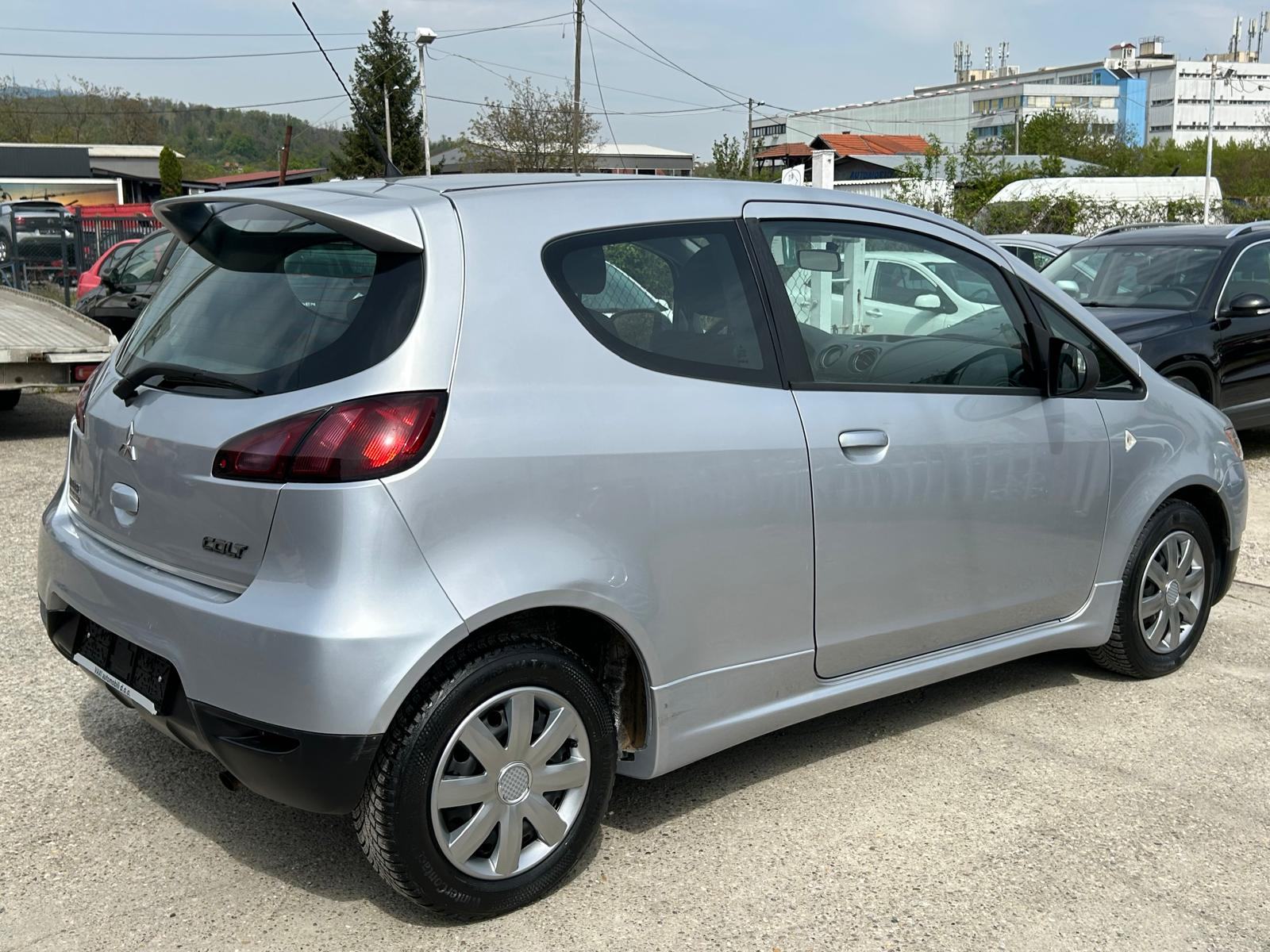 Mitsubishi Colt 1.1 2013g. 87.000km. klima....grijanje sjedala..., fotografija 5