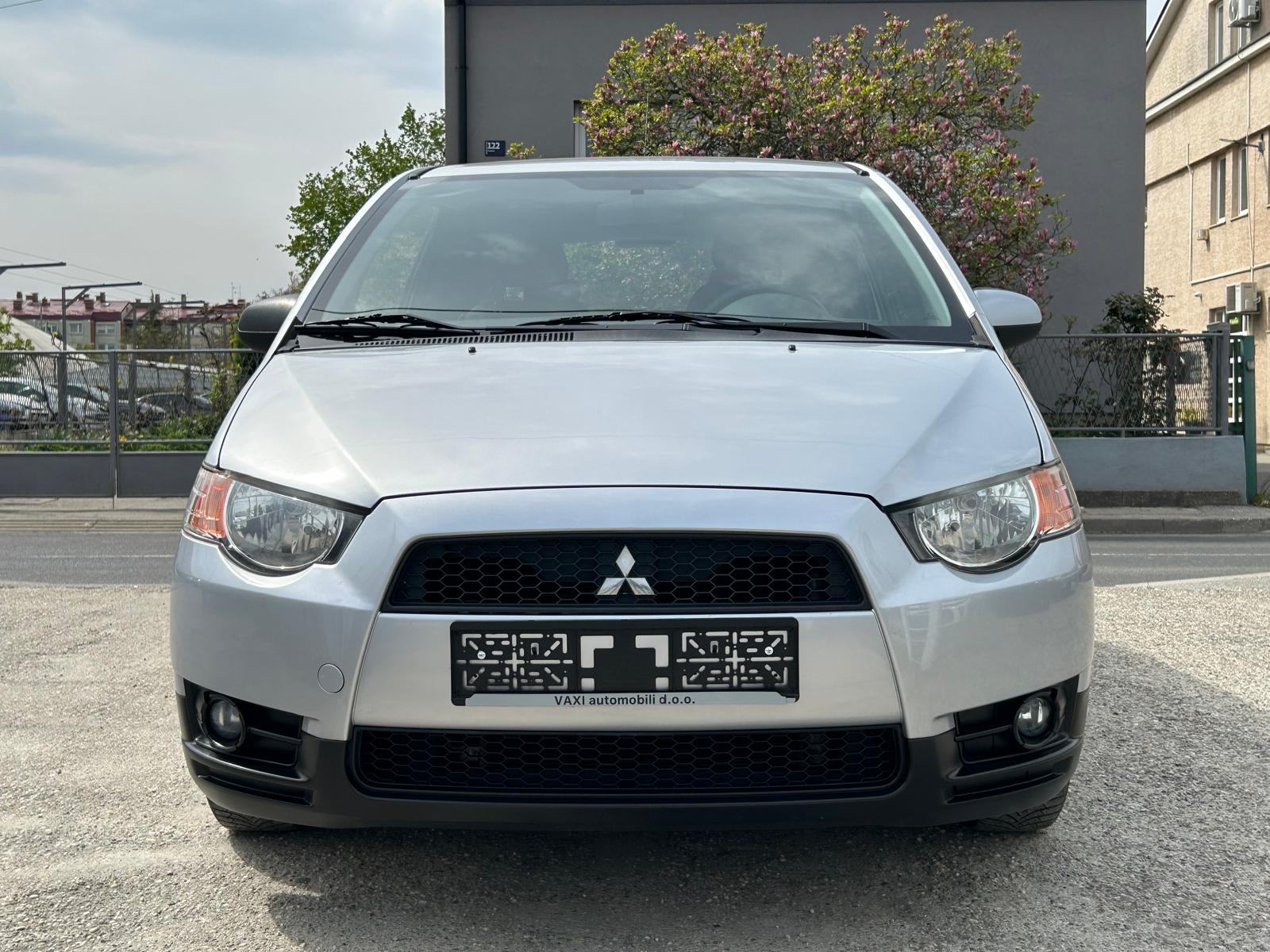 Mitsubishi Colt 1.1 2013g. 87.000km. klima....grijanje sjedala..., fotografija 2