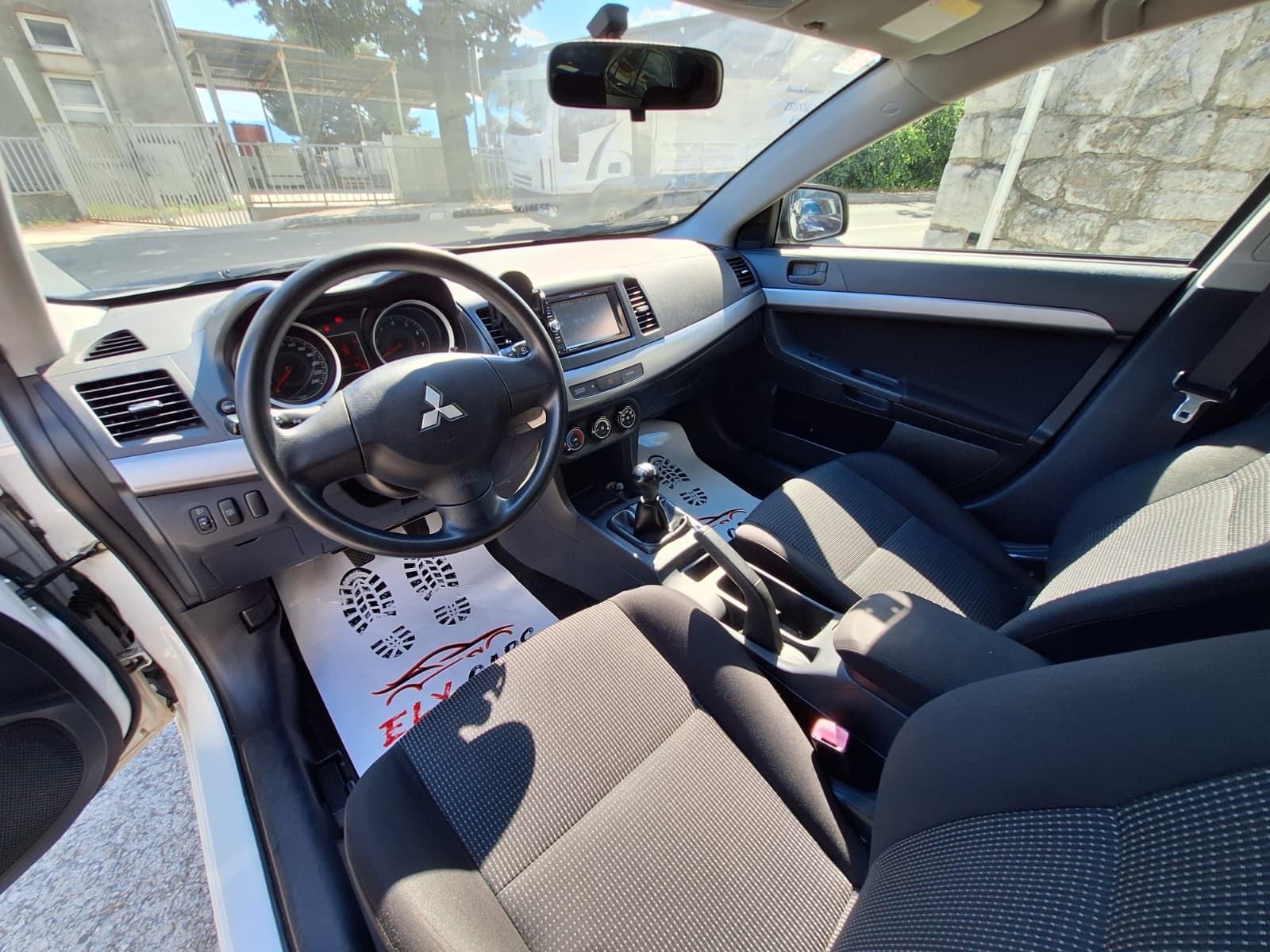 Mitsubishi Lancer 1,5 110 KS REG.11.2026, fotografija 12