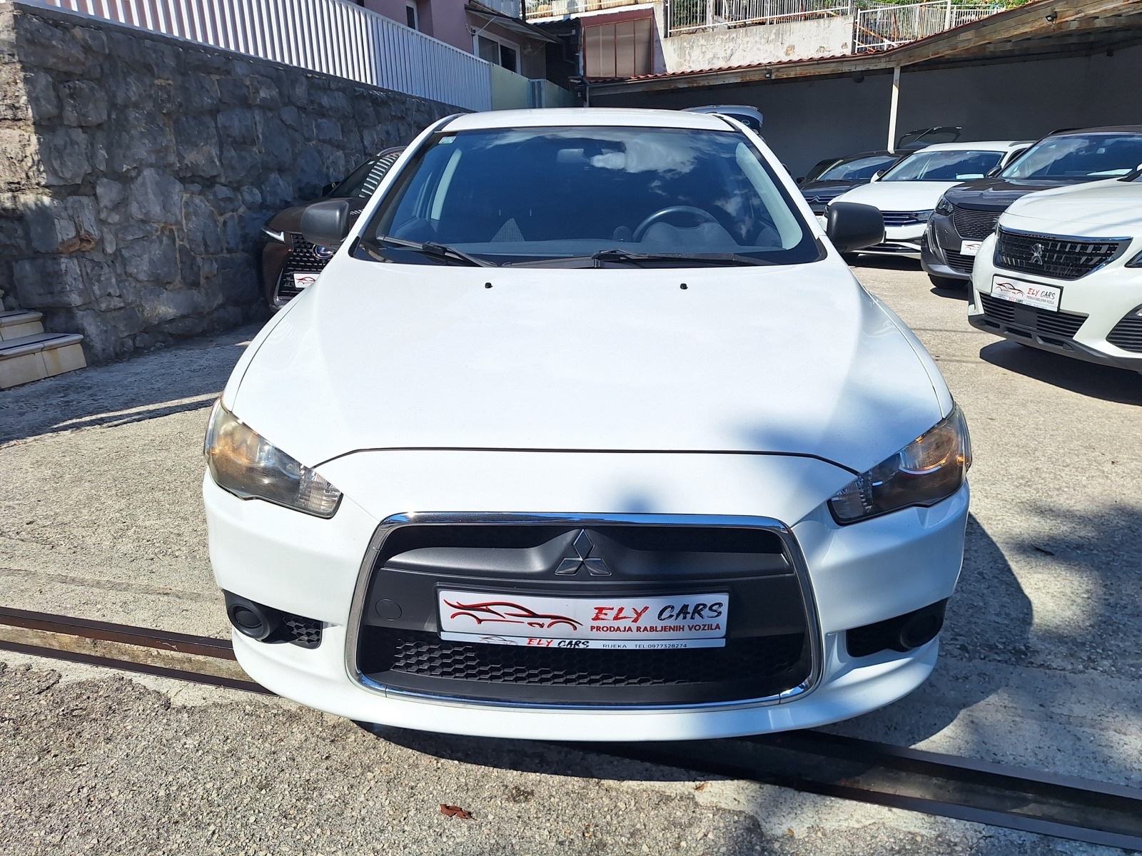Mitsubishi Lancer 1,5 110 KS REG.11.2026, fotografija 9