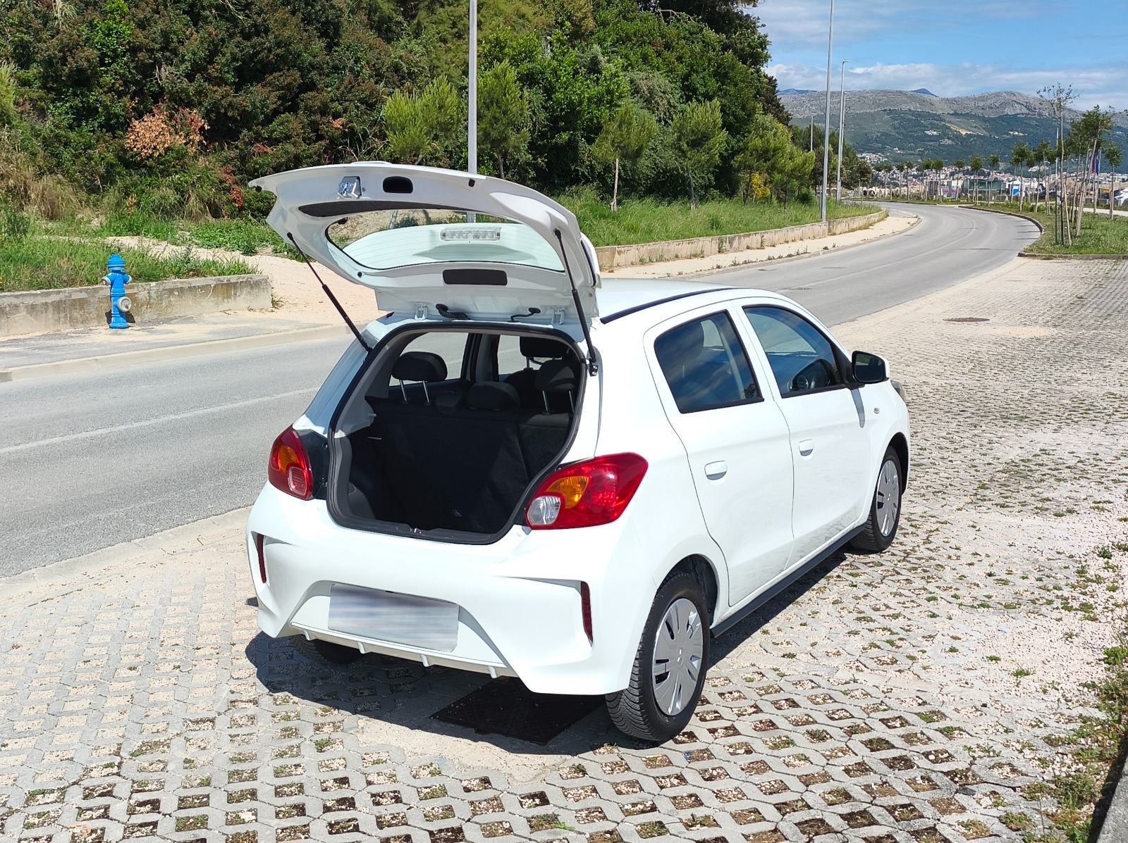 Mitsubishi Space star 1.0,52kW,70.509km,Parking kamera,multimedija, fotografija 11