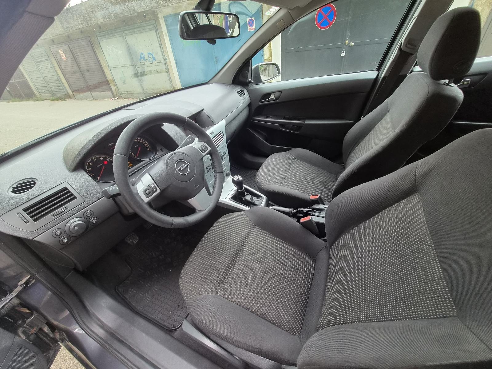 OPEL ASTRA 1.4 REGISTRIRAN DO 16.07.2027 SERVISNA I SVI RAČUNI 2009 GO, fotografija 12