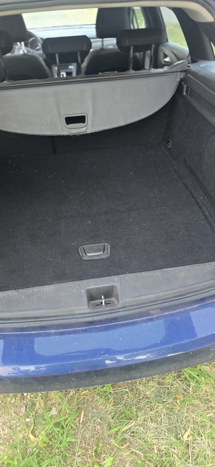 Opel Astra 1,5 D Sport Tourer, fotografija 4