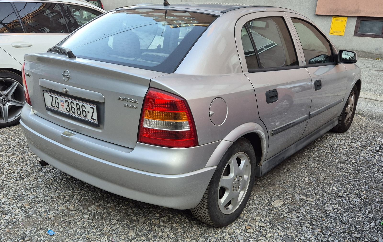 Opel Astra 1.6 16V, 2001. 242000km, prvi vlasnik, reg. do 3/27, klima, fotografija 4