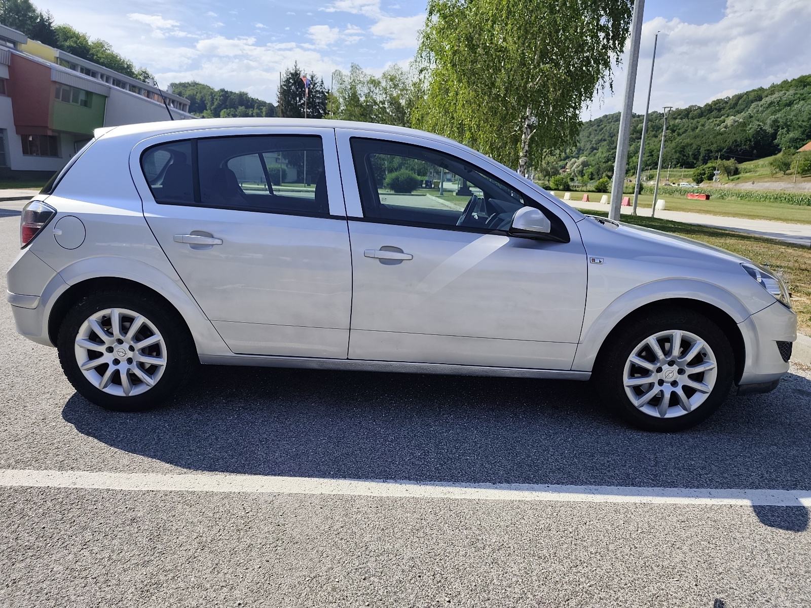 Opel Astra 1,6, 2012 god, 200 tkm, fotografija 4