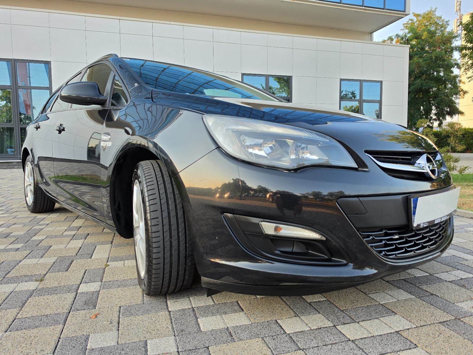 Opel Astra Karavan 1,3 CDTI **ENJOY**KLIMA**ODLIČNA**REG 1 GOD**, fotografija 15