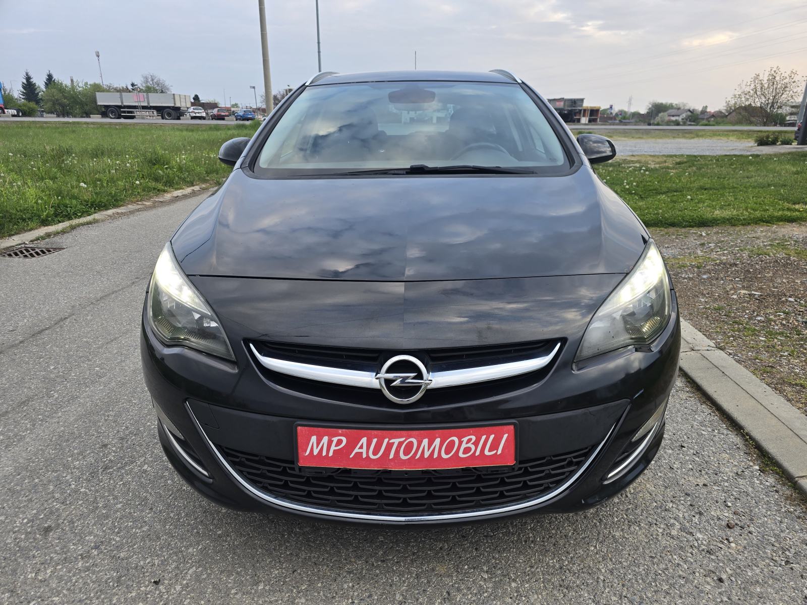 Opel Astra Karavan 1,7 CDTI-2015gd.md-NAVIGACIJA-klima,alu,kuka,KARTIC, fotografija 3