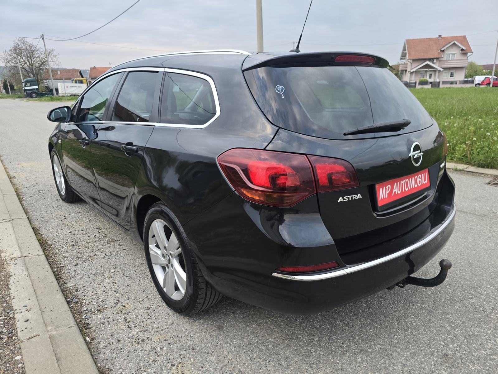 Opel Astra Karavan 1,7 CDTI-2015gd.md-NAVIGACIJA-klima,alu,kuka,KARTIC, fotografija 9