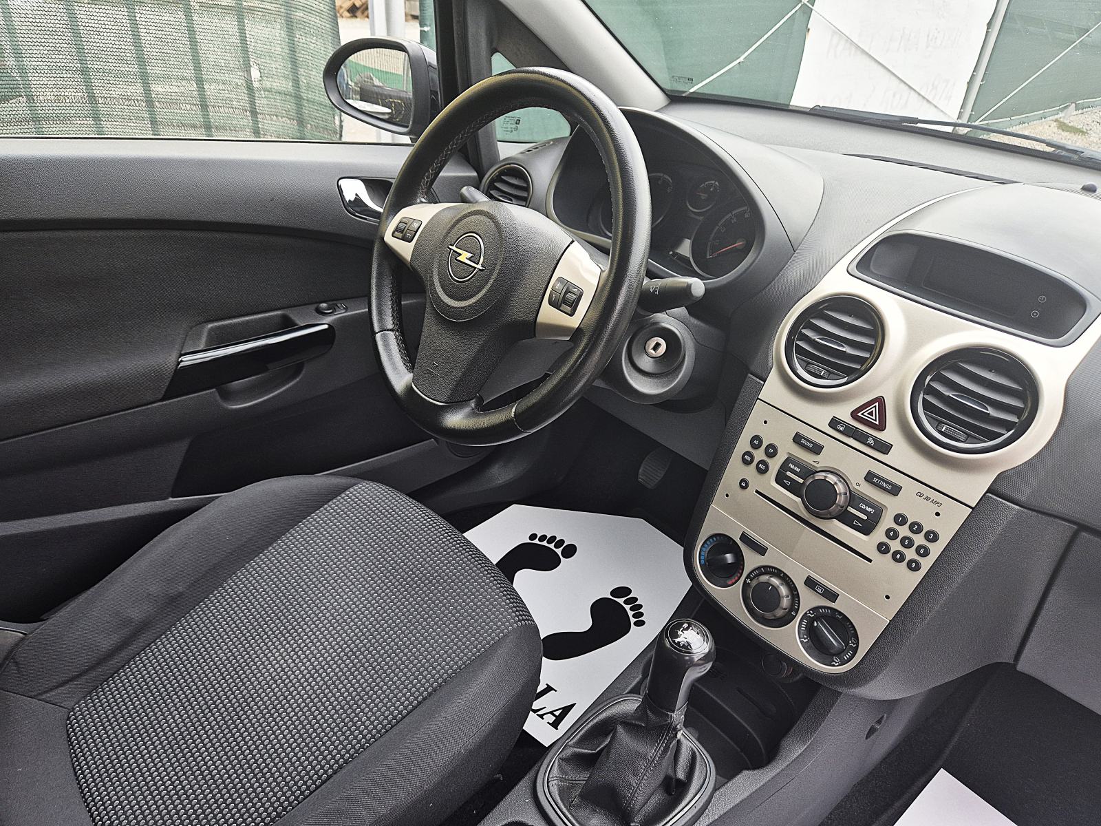 Opel Corsa 1,0 12V **REG. DO 01 /2027 .G.**, fotografija 12