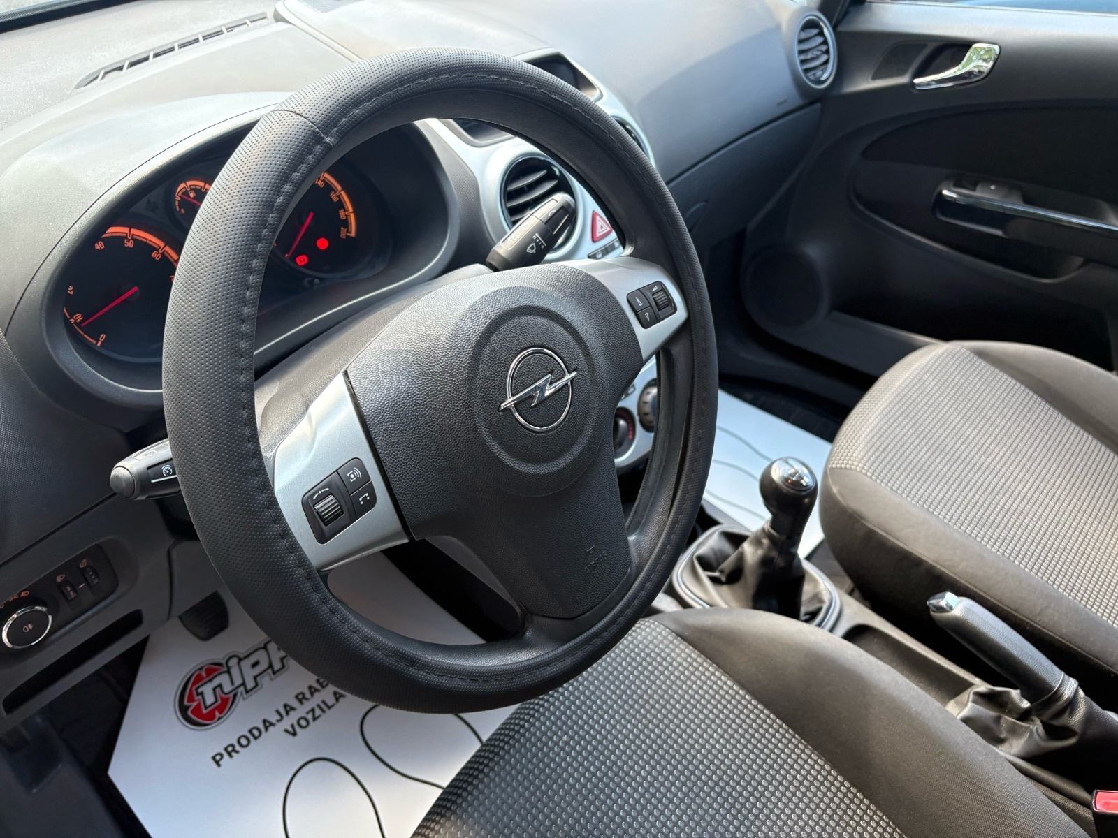 Opel Corsa 1,2 16V KLIMA - HR. AUTO - AUTOKREDIT, fotografija 9